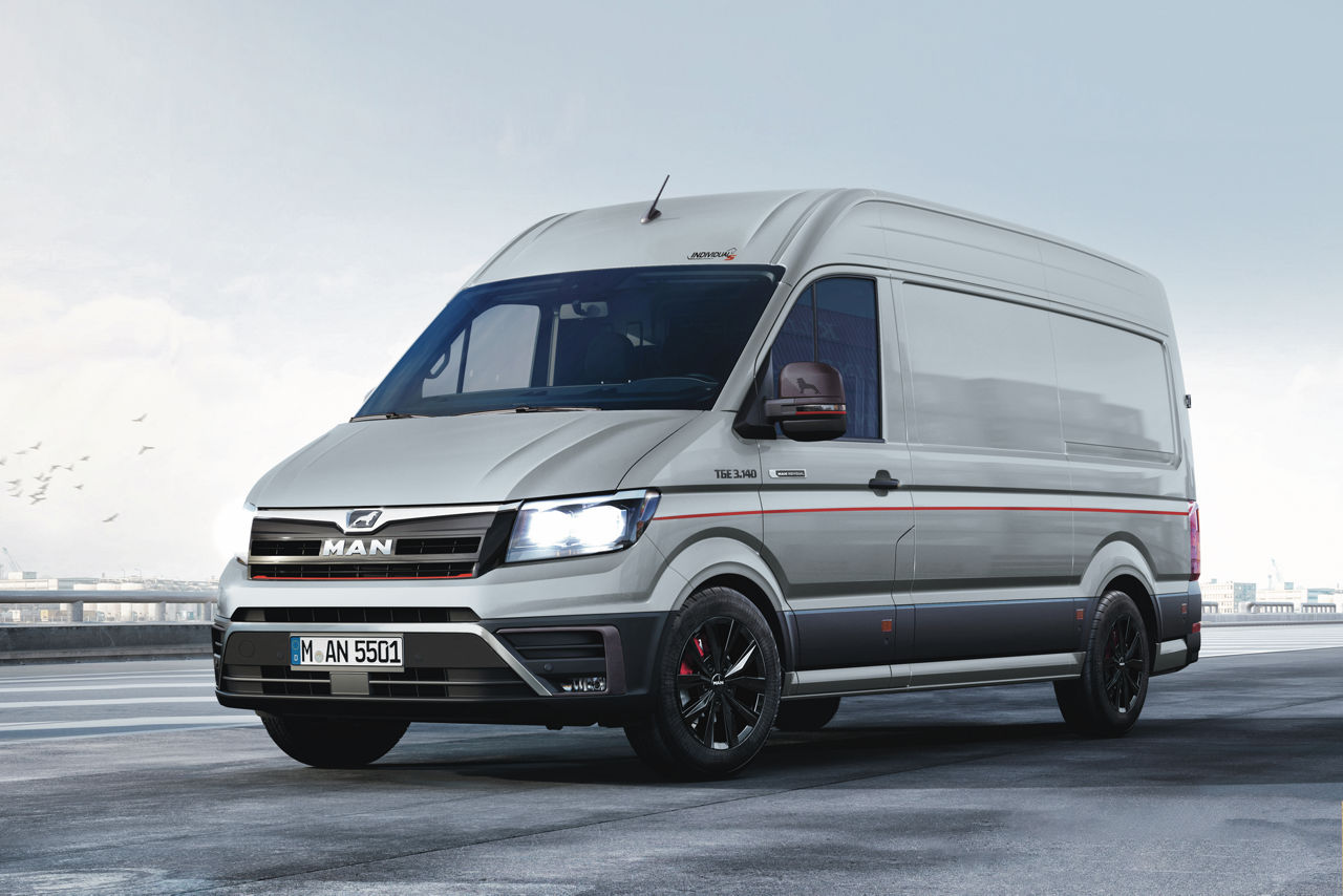 MAN TGE TGE Panel VAN on an open urban road.